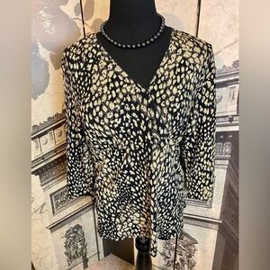 Beautiful top by East5th in size large